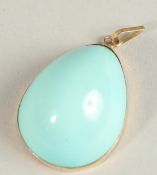 A PEAR SHAPED PENDANT.