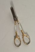 A PAIR OF GILT AND MOTHER-OF-PEARL GRAPE SCISSORS, Solingen.