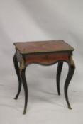 A 19TH CENTURY FRENCH BOULLE DRESSING TABLE, of serpentine outline, the rising top with mirror to