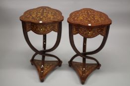 A PAIR OF LOUIS XVI STYLE SHAPED TOP INLAID TABLES on crossover legs with under-tier. 74cms high x