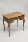 A GEORGE III DESIGN WALNUT LOW BOY, with a central drawer flanked by a pair of deep drawers on