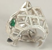 A LARGE SILVER OPEN WORK PANTHER RING. Ring size (M).