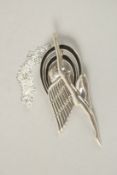 A SILVER ART DECO ENAMEL FLYING LADY PENDANT AND CHAIN.