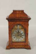 A SMALL 18TH CENTURY WALNUT CASED BRACKET CLOCK by CONYER DUNLOP, LONDON. 10cm dial. 30cms high.