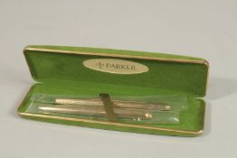 A PARKER PEN SET.