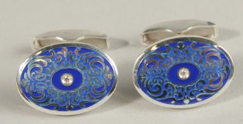 A PAIR OF STERLING SILVER, BLUE ENAMEL AND DIAMOND CUFFLINKS.