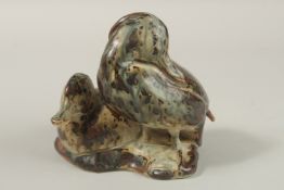 KNUD KYHN. A COPENHAGEN GLAZED STONEWARE GROUP OF TWO DUCKS, No. 20004. Impressed KK. Royal