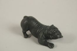 A CARVED HARDSTONE DOG. 7.5cms long.