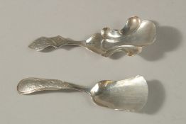 TWO 18TH CENTURY DUTCH SILVER CADDY SPOONS.