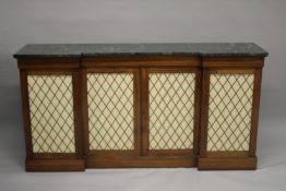 A GOOD REGENCY ROSEWOOD AND MARBLE INVERTED BREAKFRONT SIDE CABINET, with a green variegated