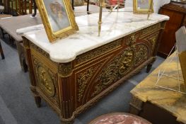 A GOOD LARGE CONTINENTAL ORMOLU MAHOGANY COMMODE with marble top.