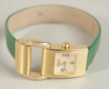 A LADIES PIAGET GOLD WRISTWATCH with leather strap. 5222 670414.