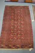 A BOKHARA RUG, 164cm x 101cm.
