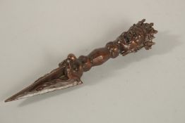 A CHINESE BRONZE PHURBA. 15cms high.