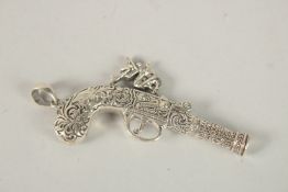 A SILVER PISTOL WHISTLE. 6.5cms.