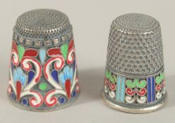 TWO RUSSIAN SILVER AND ENAMEL THIMBLES.