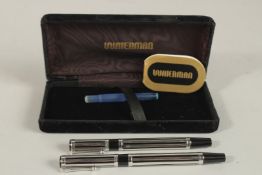 A PAIR OF CHROME WATERMAN PENS, fountain pen and pen.