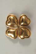 AN YVES ST. LAURENT FOUR LEAF CLOVER BROOCH.