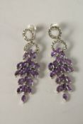 A PAIR OF AMETHYST AND MARCASITE WATERFALL EARRINGS.