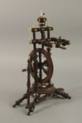 A MINIATURE 19TH CENTURY CARVED WOOD AND BONE SPINNING WHEEL. 36cms high.