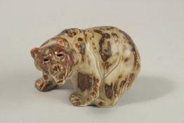 KNUD KYHN. A SMALL COPENHAGEN GLAZED STONEWARE STANDING BEAR, No. 5879. Impressed KK three times.