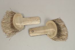 A PAIR OF SILVER EPAULETTES in a green box. BAILHAGHE & CHARDON, PARIS.