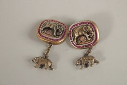 A PAIR OF RUSSIAN SILVER AND RUBY ELEPHANT CUFFLINKS.