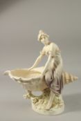 A ROYAL DUX PORCELAIN SHAPED BOWL with classical young lady. 35cms high. Printed triangle mark.