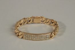 A GOOD HEAVY 9CT GOLD BRACELET with three rows of diamonds. Total weight 51.97gms.