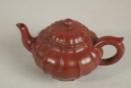 A CHINESE YIXING TEAPOT with boxx.