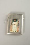A SILVER VESTA CASE Birmingham 1907, with an enamel of W. G. GRACE.
