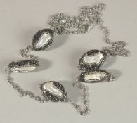 A GOOD FRESH WATER BAROQUE PEARL AND RHINESTONE LONG NECKLACE AND EARRINGS.