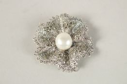 A SILVER MARCASITE AND PEARL BROOCH.