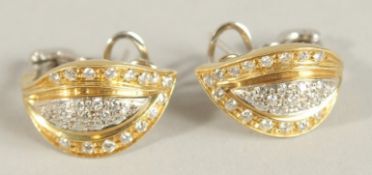 A PAIR OF 18CT GOLD AND DIAMOND EARRINGS.