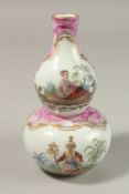 A GOOD FRENCH PORCELAIN DOUBLE GOURD VASE painted with Turkish scenes and flowers. 20cms high.