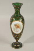 A GOOD BOHEMIAN RUBY GLASS VASE with gilt decoration and an oval portrait of a young girl. 30cms
