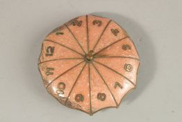A SMALL CONTINENTAL ENAMELLED UMBRELLA CLOCK, No. 1-12, with German movement. 9cms diameter (AF).