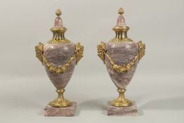 A VERY GOOD PAIR OF LOUIS XVI DESIGN PINK MARBLE AND ORMOLU CASSOLETTES with pineapple finial, masks