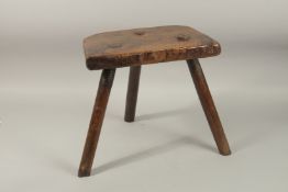 AN EARLY THREE LEG CUTLER'S STOOL, Good Colour. 36cms high x 40cms wide.