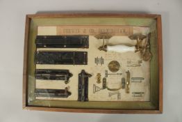 A GERWIN & CO., BIRMINGHAM CASED HANDLE, BOLTS. ETC., framed and glazed. 36cms x 52cms.