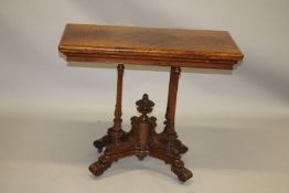 A GOOD VICTORIAN FIGURED WALNUT RECTANGULAR FOLD OVER CARD TABLE with a quarter veneered top,