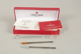 A SOLID SILVER CARAN D'ACHE PEN.