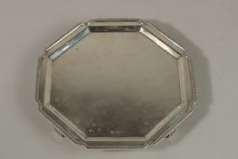 A GOOD WALKER & HALL SILVER OCTAGONAL SALVER. 21cms wide. Sheffield 1956. 14ozs.