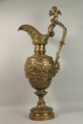 A VERY GOOD EXCEPTIONALLY LARGE CLASSICAL BRONZE EWER with winged cupid handles, a band of cupids