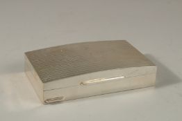 A GOOD .800 SILVER DOMED TOP CIGARETTE CASE.15cms long x 9cms wide. 9ozs.