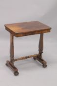 A LATE REGENCY ROSEWOOD SIDE TABLE with figured rosewood legs, shaped ends and turned uniting