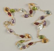 AN 18CT GOLD MULTI-GEM NECKLACE.