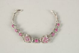 A SILVER RUBY AND MARCASITE PANTHER BRACELET.