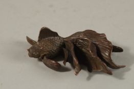 A BRONZE OKIMONO OF A FISH.