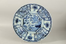 A CHINESE EXPORT BLUE AND WHITE PORCELAIN KRAAK STYLE CHARGER, 44cm diameter.